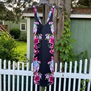 Guess size 6 new with tags. Never worn. Zip back.